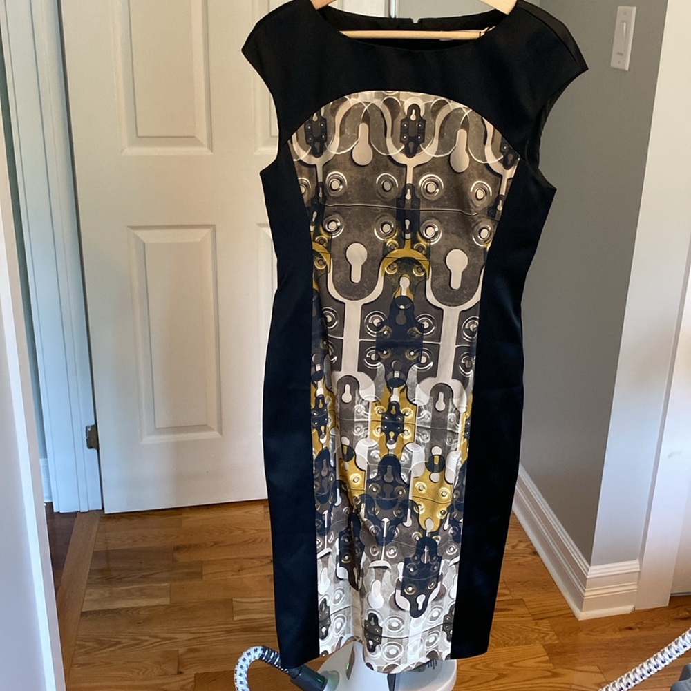 Karen Millen knee length black dress. Perfect for any occasion NWT.